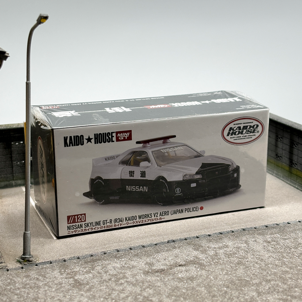 Kaido House x MINI GT 1:64 Nissan Skyline GT-R R34 Police Car (#120)