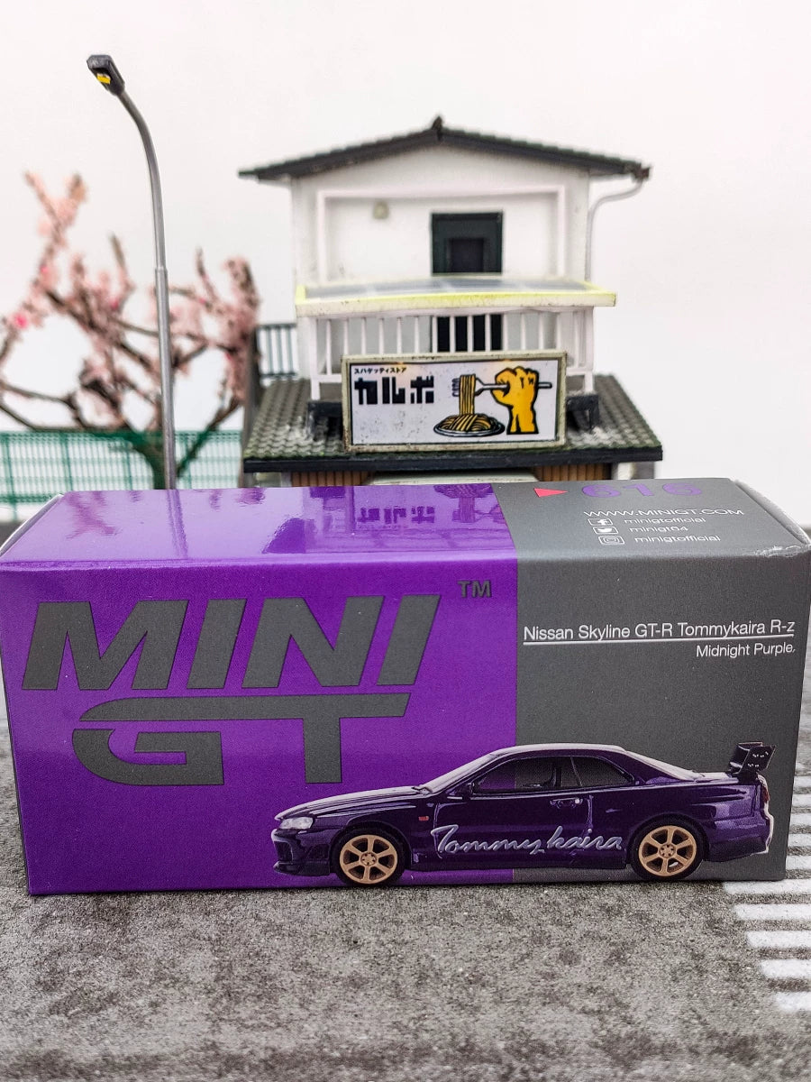 MINI GT 1:64 Nissan Skyline GT-R (R34) Tommykaira – Midnight Purple Edition