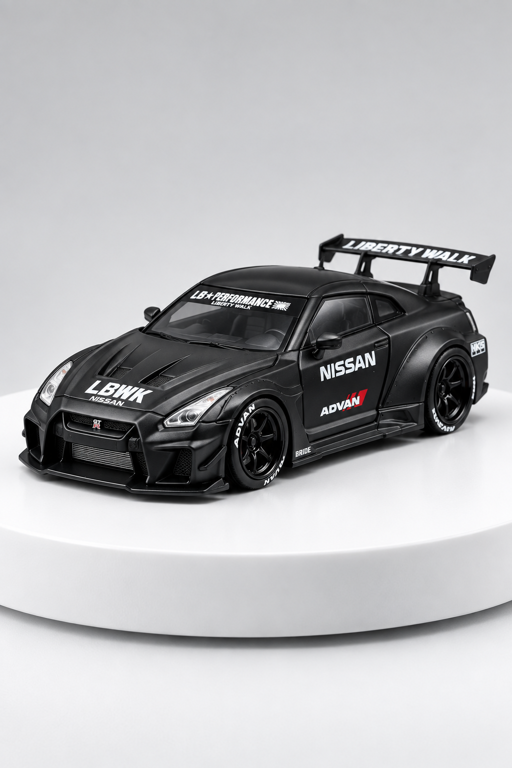 Nissan GT-R 35GT-RR LBWK matte black 1:64 diecast front three-quarter studio view
