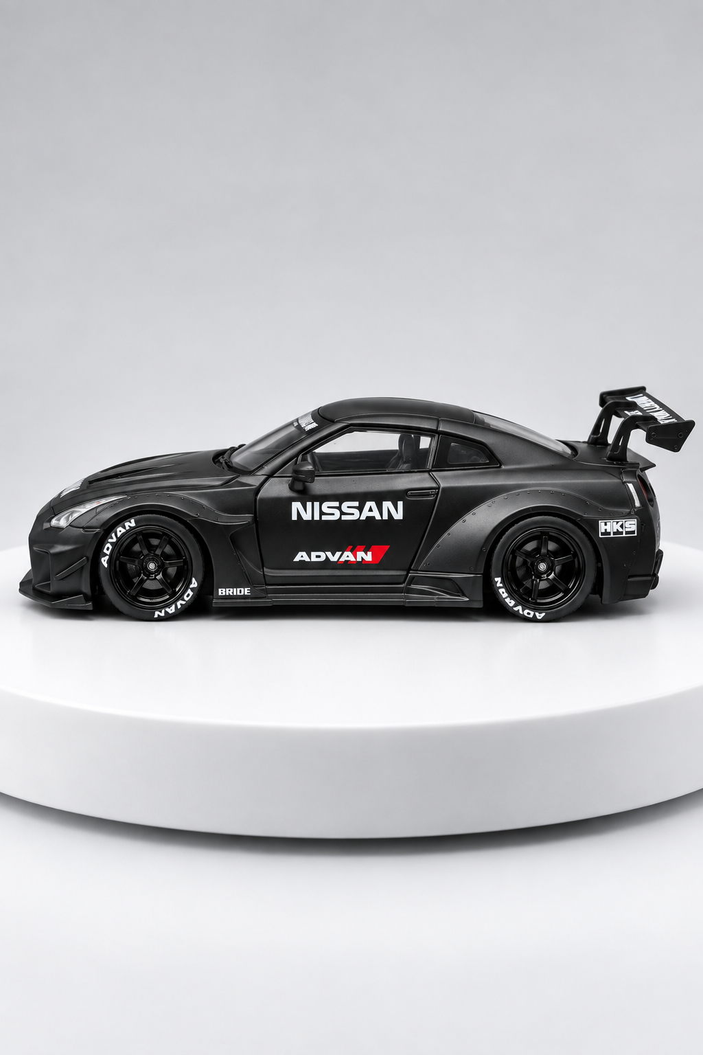 Nissan GT-R 35GT-RR LBWK matte black 1:64 diecast side studio view
