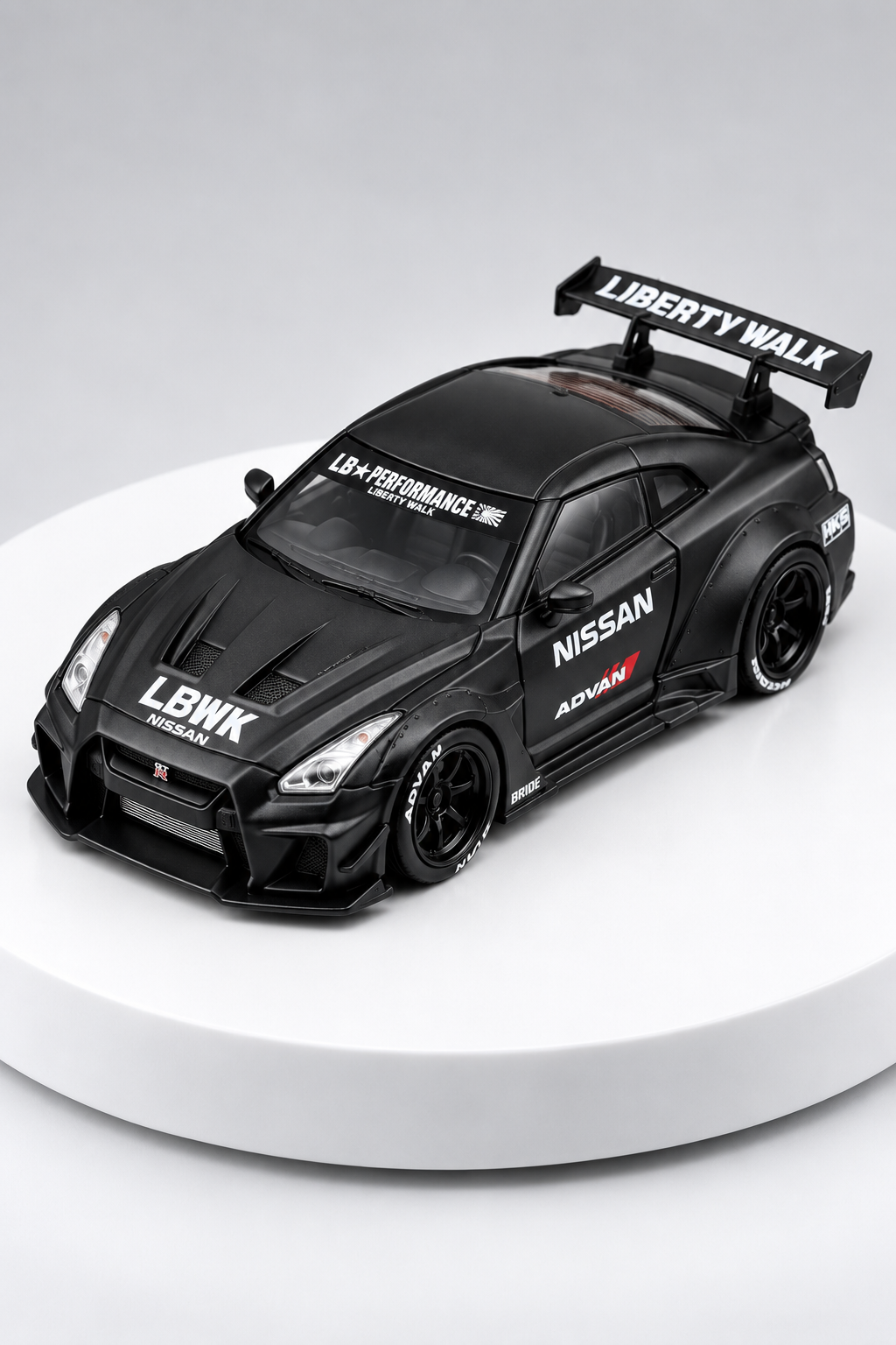 Nissan GT-R 35GT-RR LBWK matte black 1:64 diecast elevated studio view