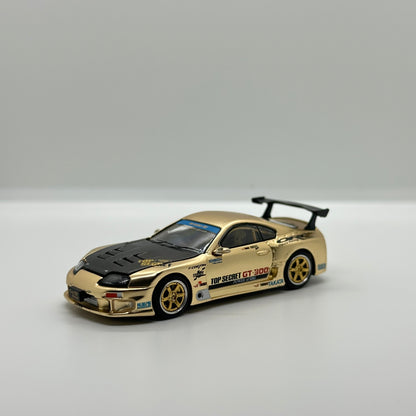 POP RACE PR64-277 Top Secret GT300 Supra gold 1:64 diecast front three-quarter view