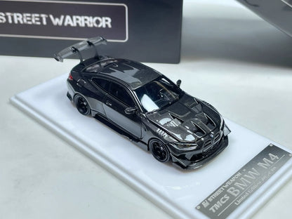 Street Warrior TMCS BMW M4 1:64 carbon-fiber style diecast front three-quarter view